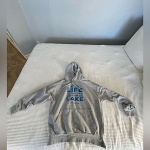 Life is better at the lake hoodie. Small cut onling the seem of the waistband